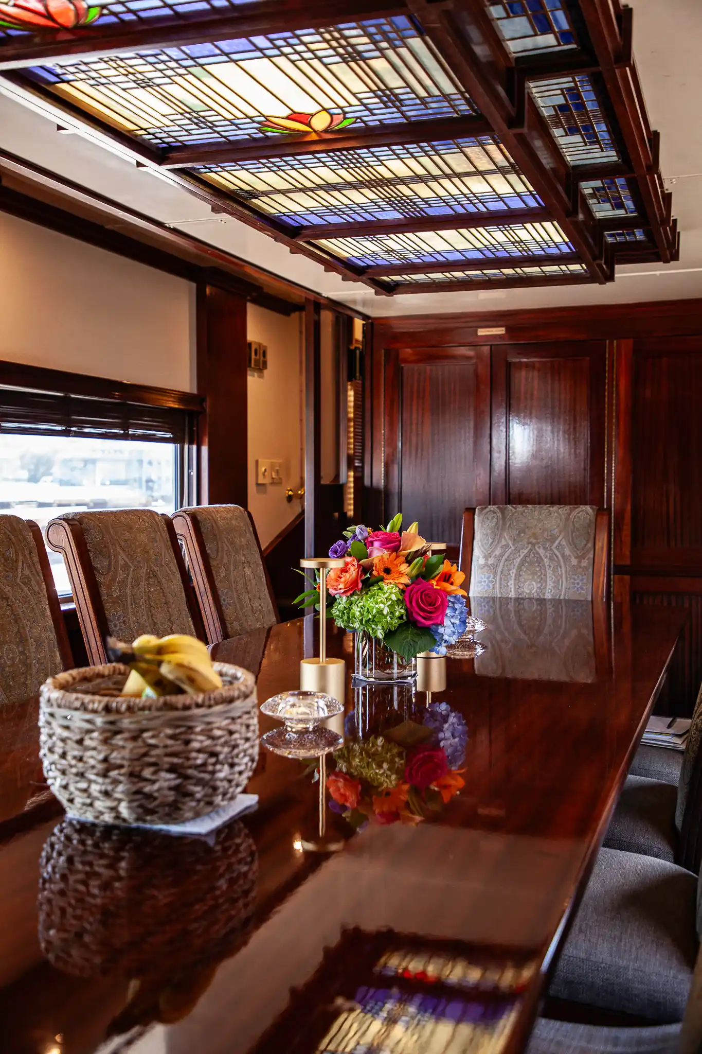 An elegant dining room inside of a private railcar
